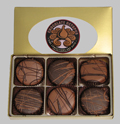 OreoTM Cookies | 6 Piece Box - America&#8217;s favorite cookie is dipped in kettles of pure milk, dark and white chocolate.  Six Oreo cookies are packed in a gift box with a decorative cord.